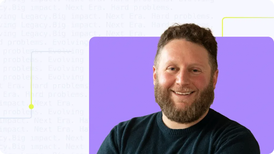 Headshot of a smiling man with a beard against a purple and branded text background